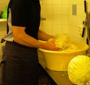 squeeze cabbage with hands Shredded cabbage