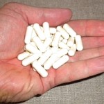 probiotic capsules in hand